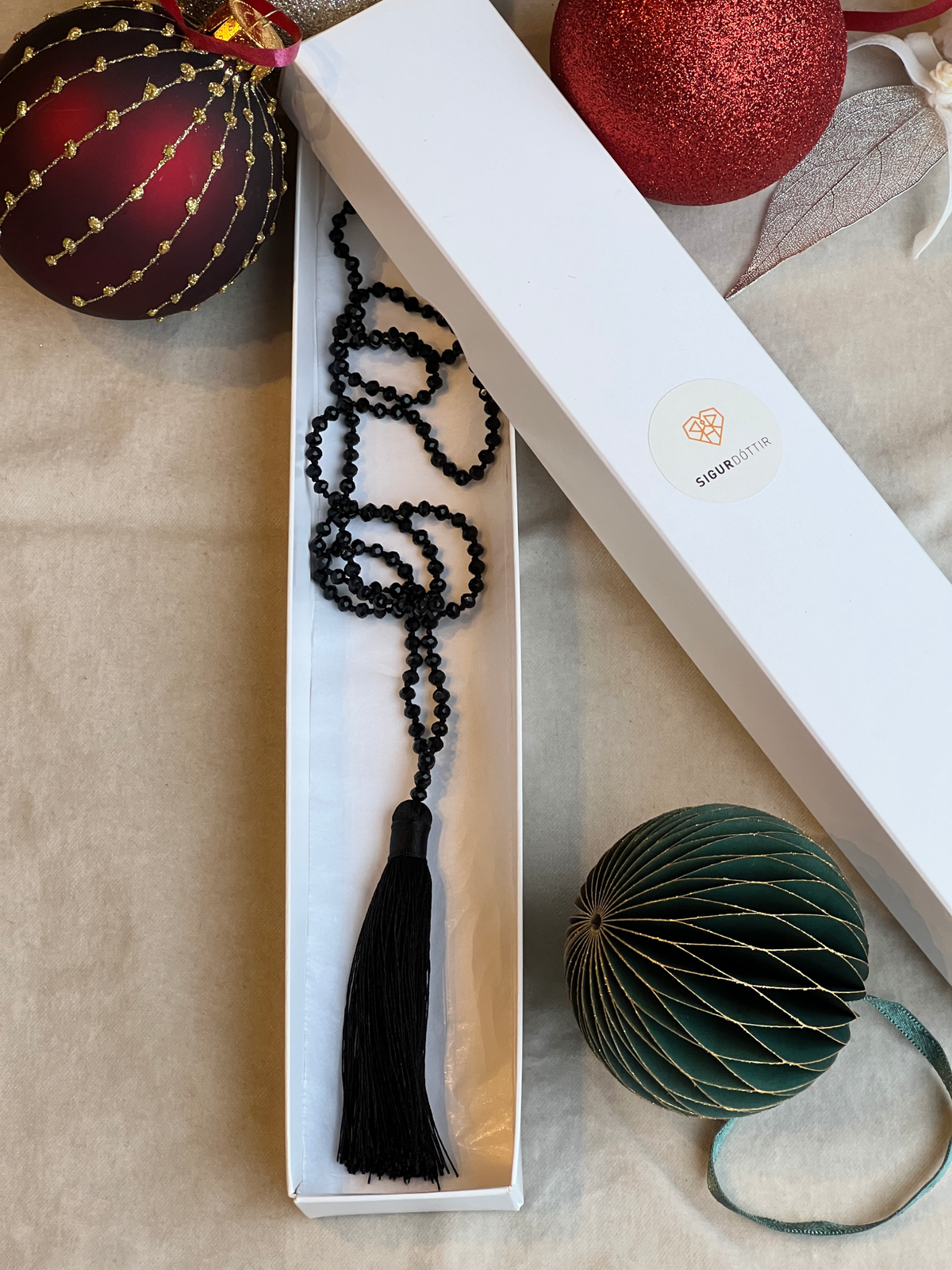 Handcrafted Black Glass Necklace with Tassel